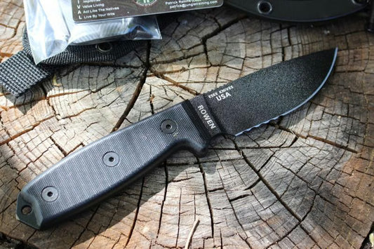 ESEE Model 3, serrated, black G-10, black plastic sheath, nylon sheath