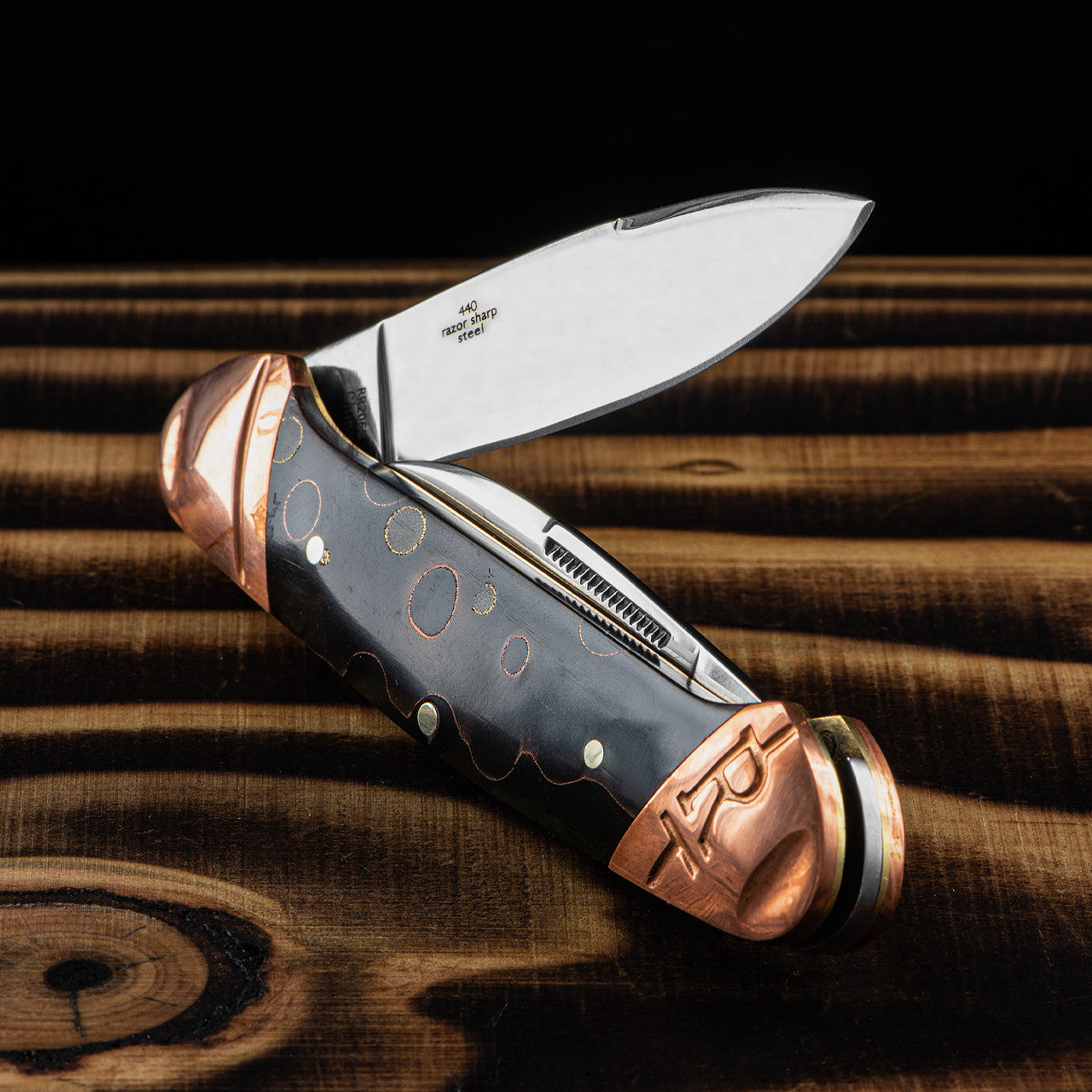 Rough Rider 2061 Small Leg Copper Swirl Knife Black Handles
